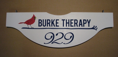 Custom business sign in 2" thick cypress, carved letters and hand painted artwork